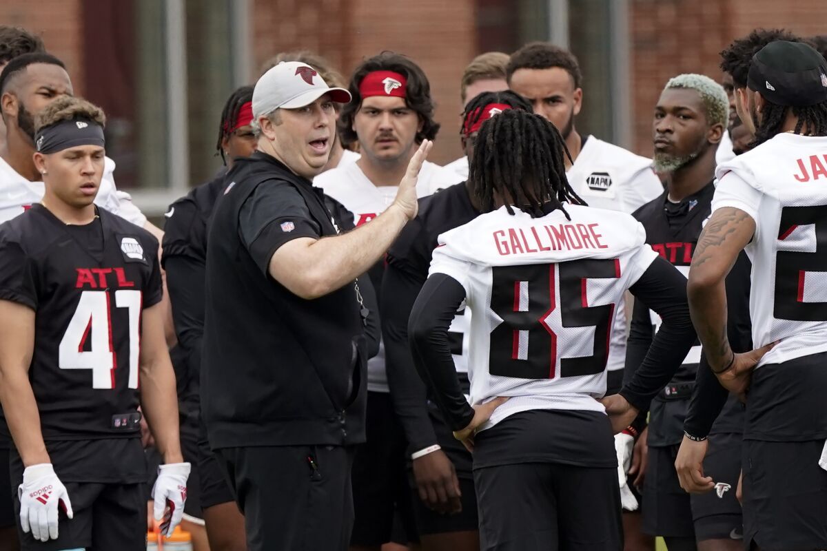 Atlanta Falcons head coach Arthur Smith talks to his players during NFL rookie minicamp football practice, Friday, May 13, 2022, in Flowery Branch, Ga. (AP Photo/John Bazemore)