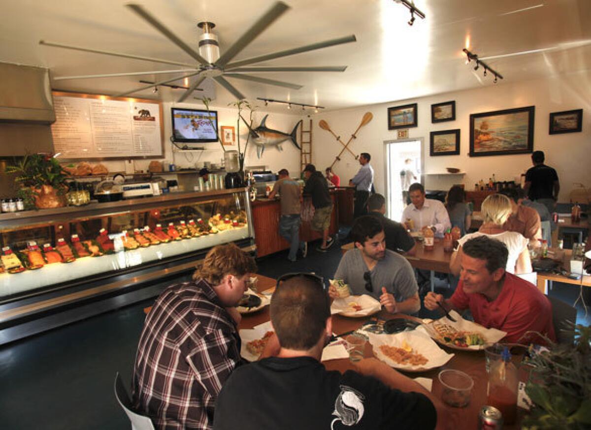 The Bear Flag Fish Co. in Newport Beach is a fish market that also serves a loyal crowd with fresh seafood, sandwiches, tacos, burritos, salads and more.