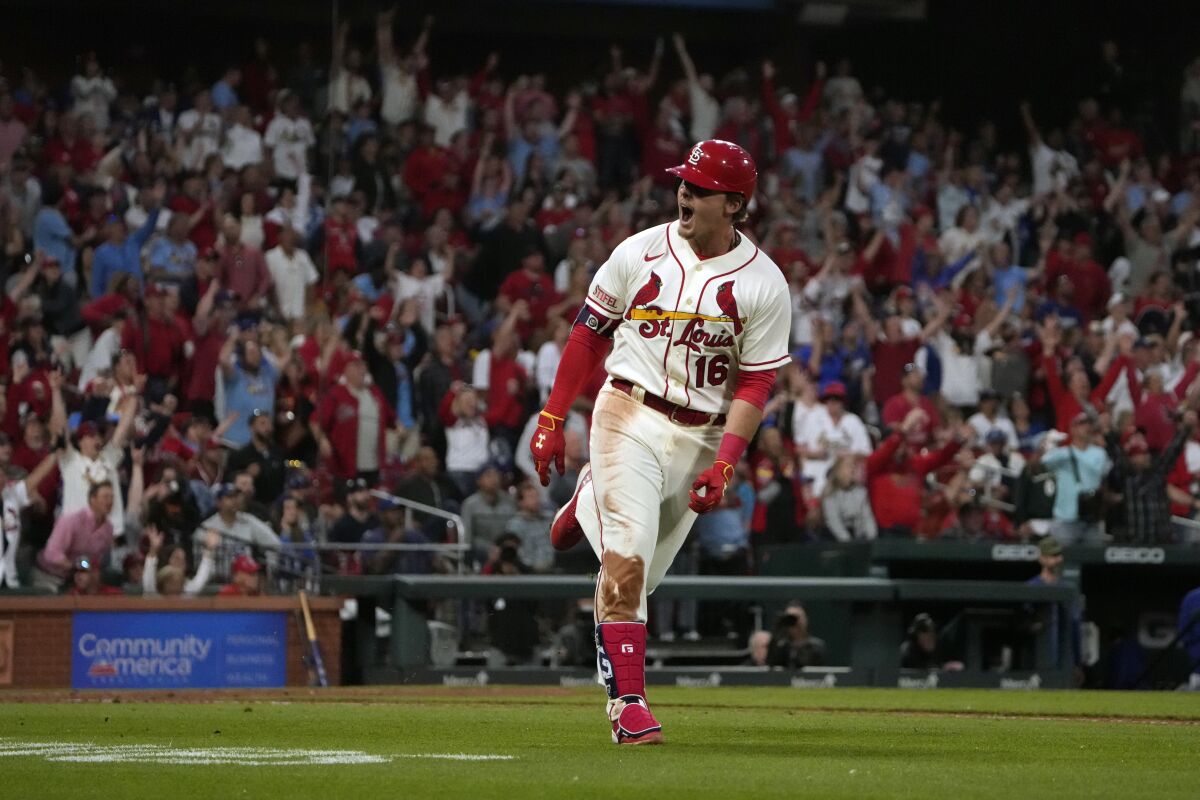 The Cardinals' Nolan Gorman celebrates after he hit a three-run home run during the eighth inning.