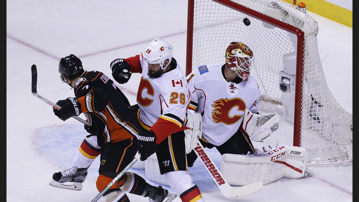 Ducks left wing Jakob Silfverberg scores the first goal of the game against Flames goalie Brian Elliott during the first period.