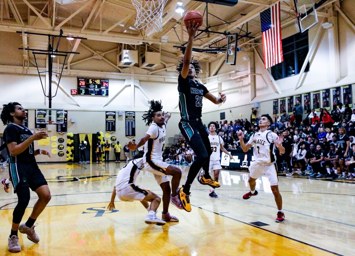 Marcus Adams Jr. goes up for two of his 40 points in Narbonne's 77-67 win over San Pedro on Friday night.