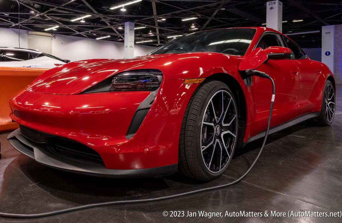 Electric Porsche Taycan charging.
