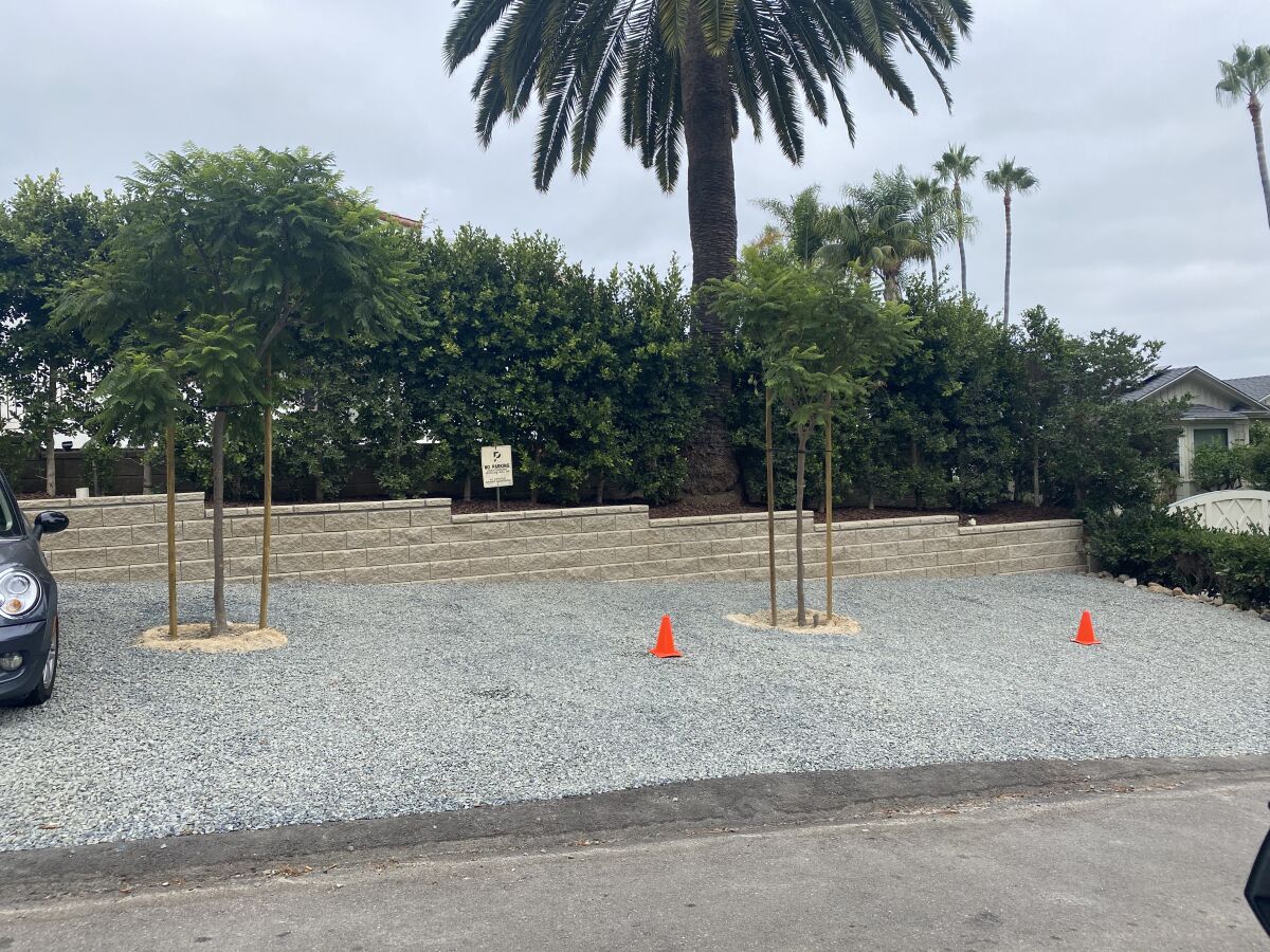 The renovated gravel area fronting a house on Little Street was determined to be in the public right of way.