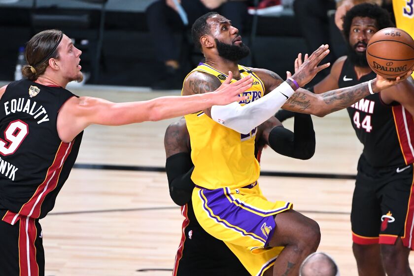 ORLANDO, FLORIDA SEPTEMBER 30, 2020-Lakers LeBron James drives to the basket.