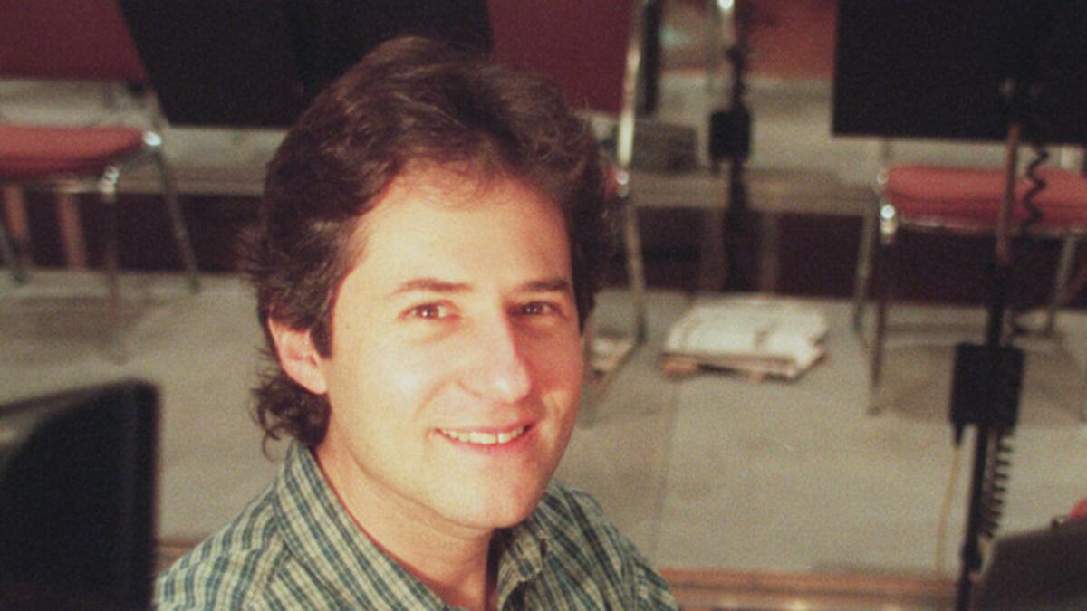 Composer James Horner poses in Todd–AO recording studio after spending the day conducting orchestra for music for "Casper."