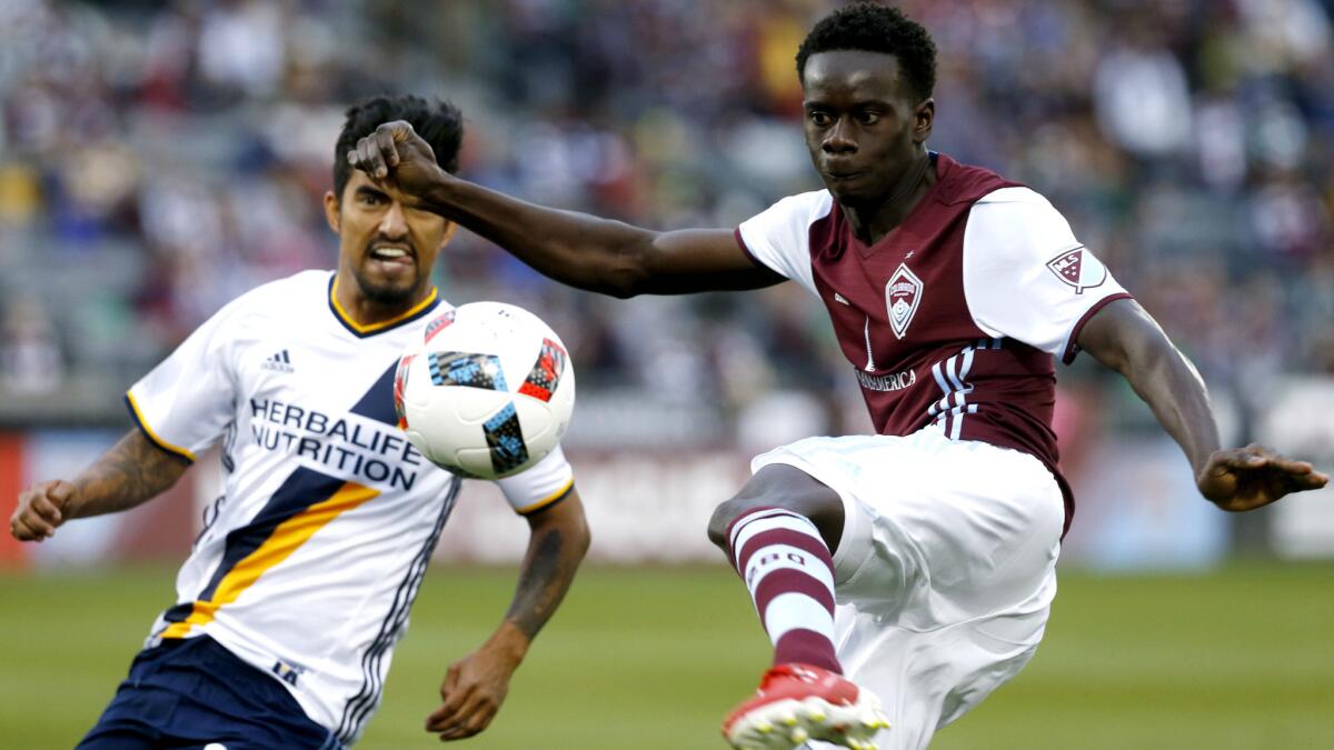 Rapids forward Dominique Badji tries to volley a pass against Galaxy defender A. J. DeLaGarza during the first half Saturday.