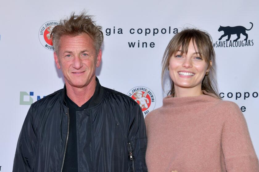 LOS ANGELES, CALIFORNIA - MARCH 08: (L-R) Sean Penn and Leila George attend "Meet Me In Australia" To Benefit Australia Wildfire Relief Efforts, hosted by The Greater Los Angeles Zoo Association, at Los Angeles Zoo on March 08, 2020 in Los Angeles, California. (Photo by Rodin Eckenroth/Getty Images)