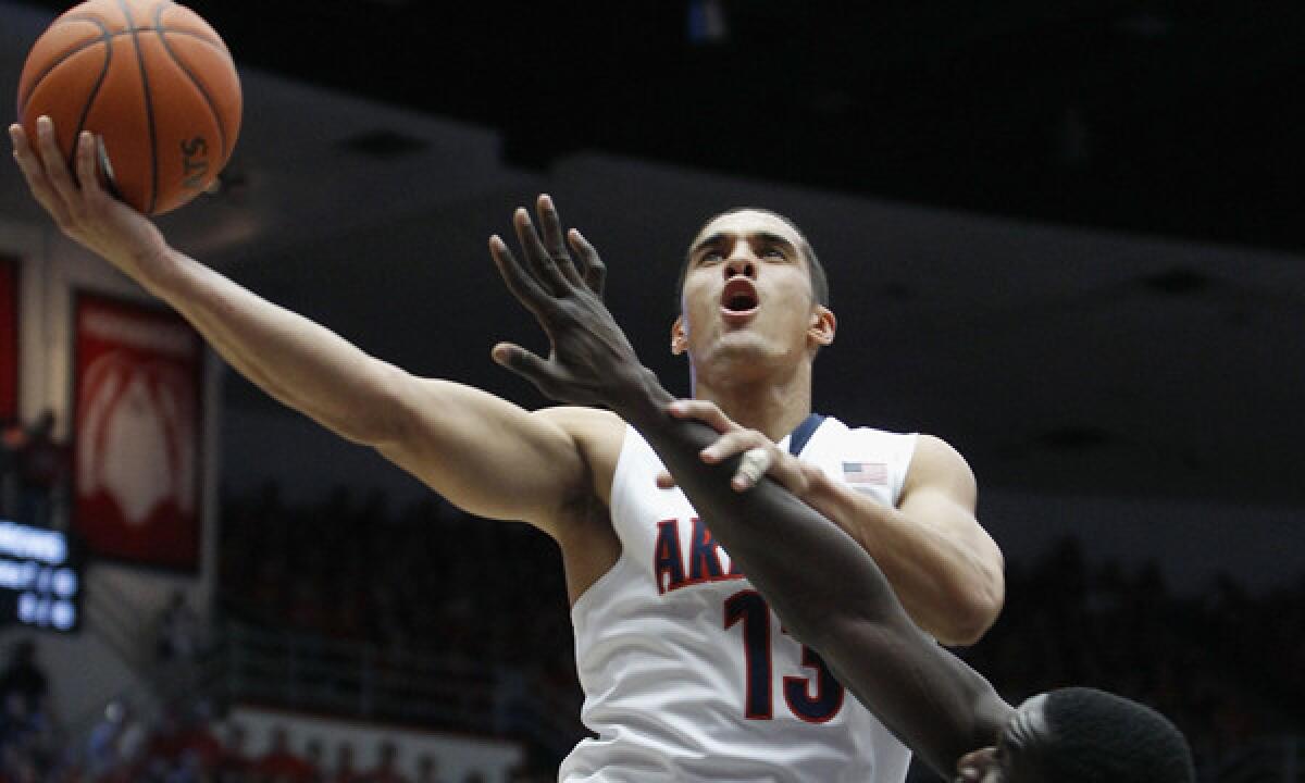 Arizona's Nick Johnson puts up a shot during a win over Oregon State on Sunday. The Wildcats are looking to go undefeated the rest of the way in Pac-12 conference play.