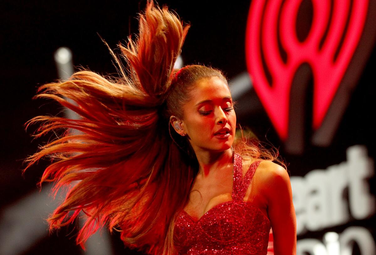 Ariana Grande performs at KIIS-FM's Jingle Ball concert at Staples Center in Los Angeles on Dec. 5, 2014.