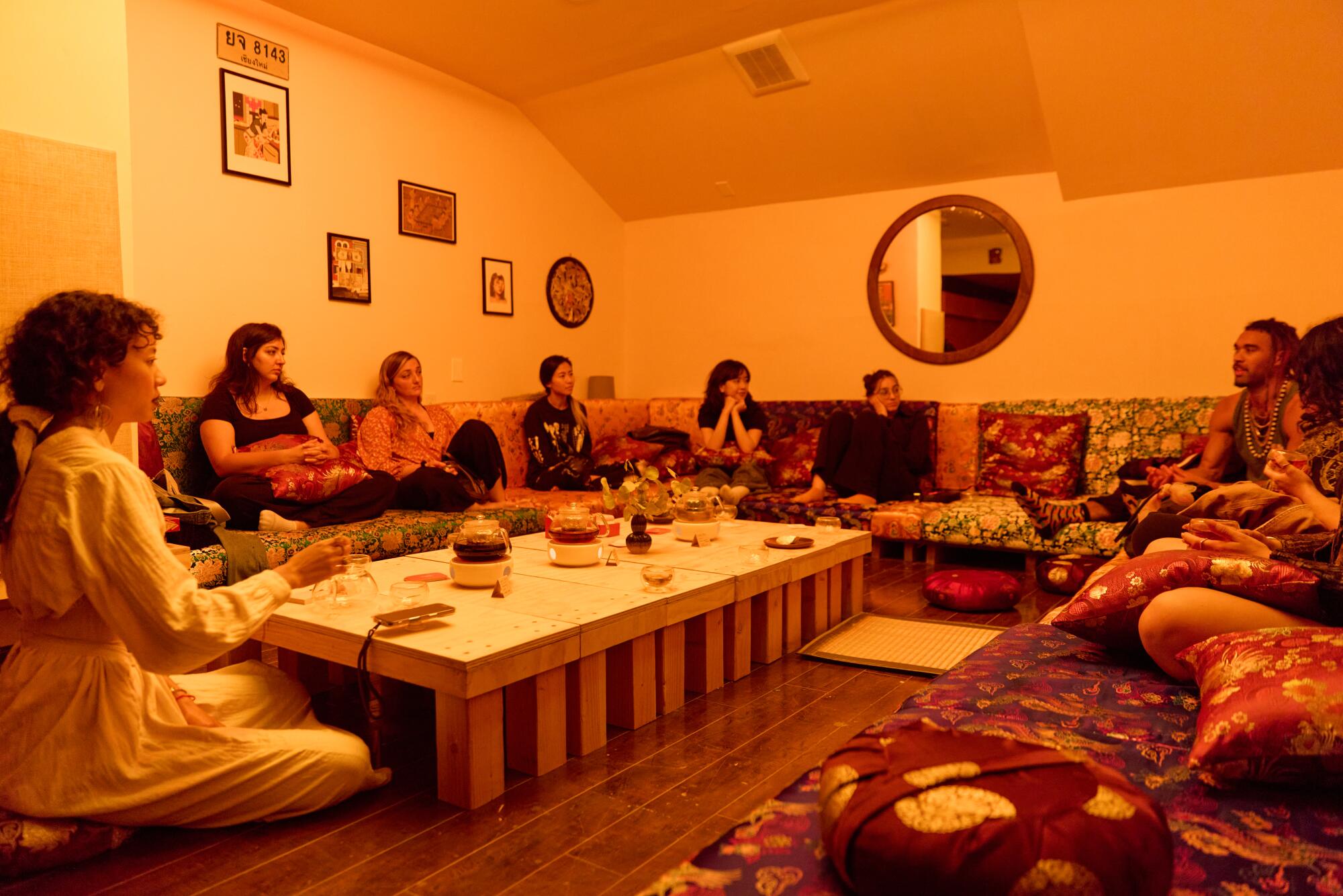 Guests socialize on a Saturday night at Jai Tea Loft in Koreatown.