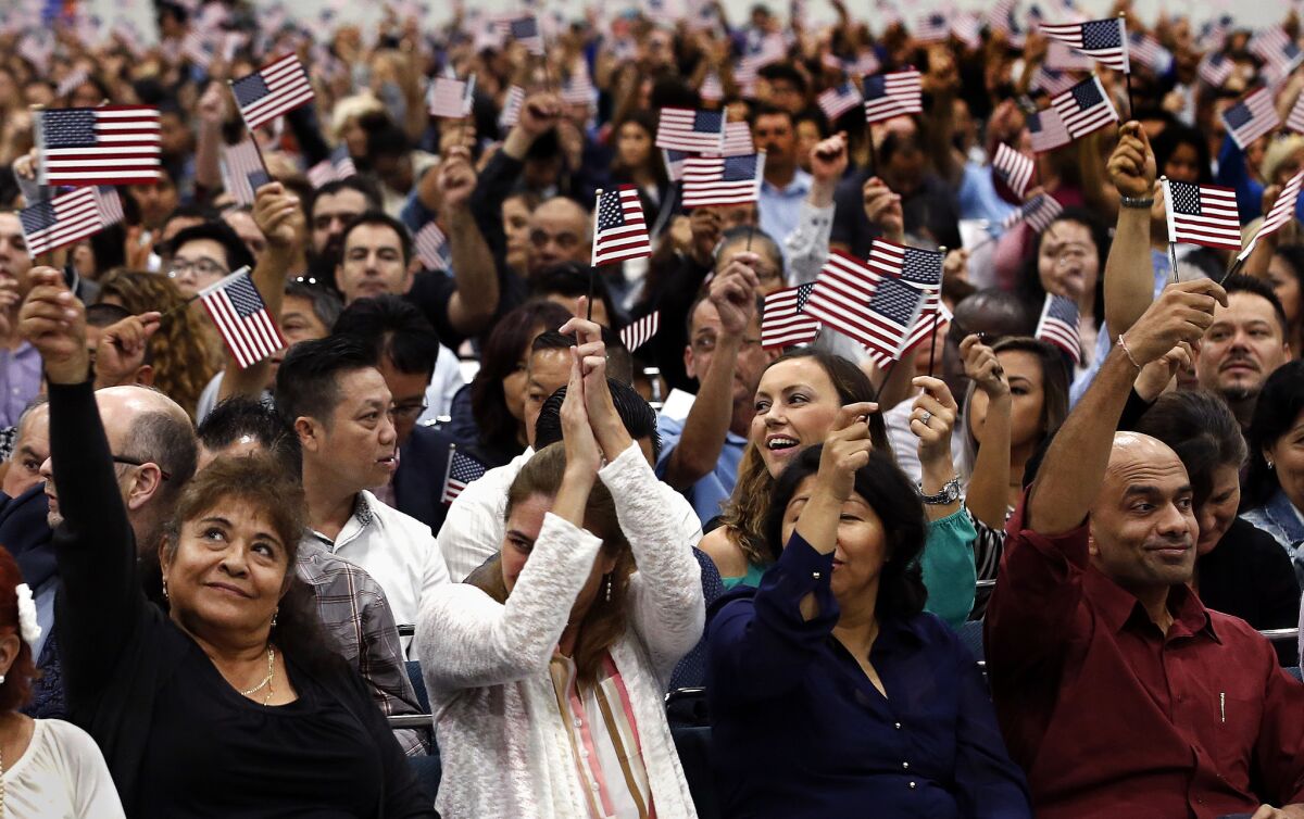 New citizens during a naturalization ceremony at the L.A. Convention Center.
