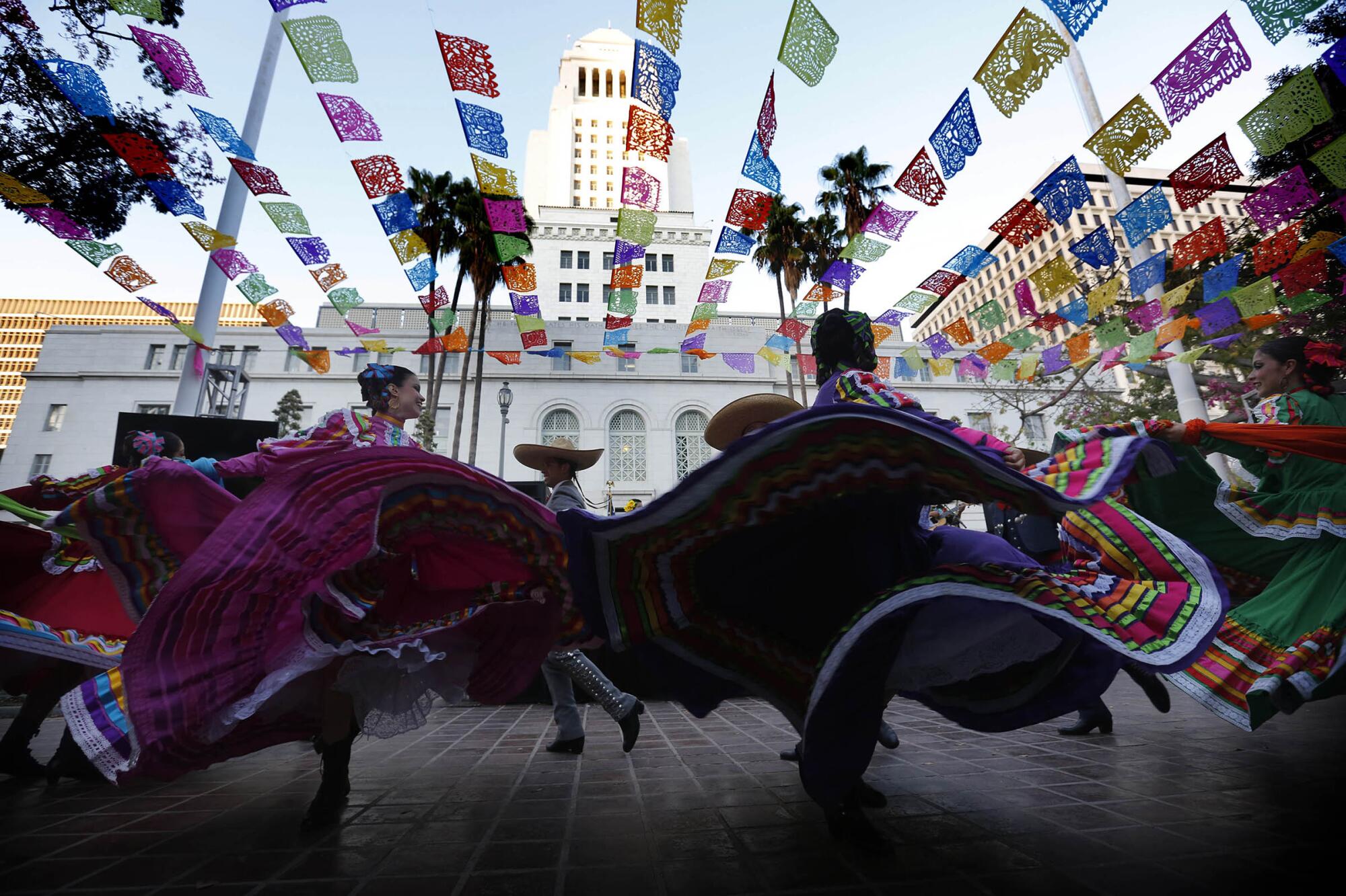 Folklorico dancers perform near City Hall in Los Angeles