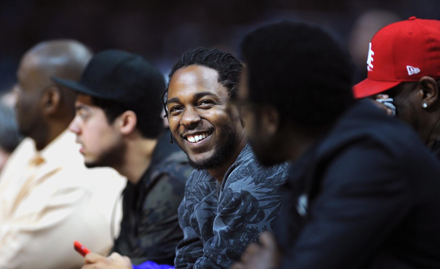 Rapper Kendrick Lamar sits courtside at the Clippers vs. Cavaliers game at Staples Center.