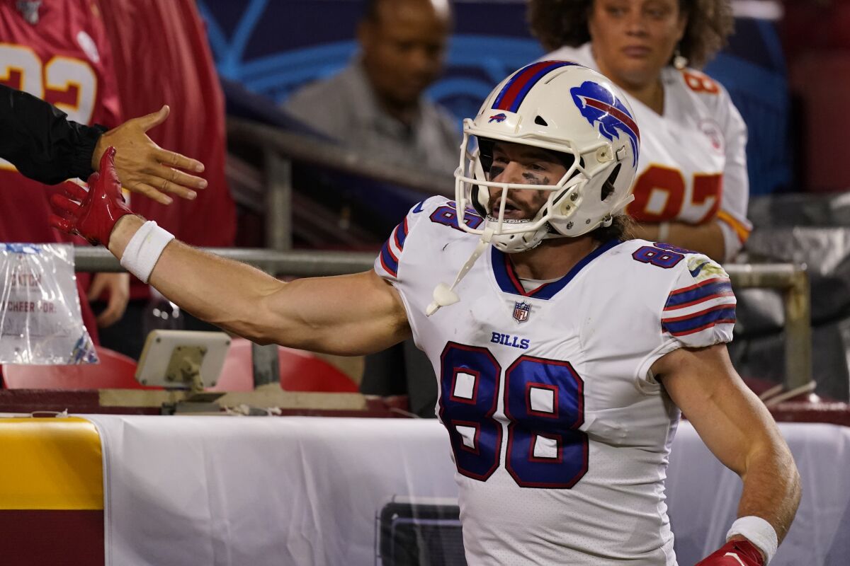 Buffalo Bills tight end Dawson Knox celebrates after scoring during the first half of an NFL football game against the Kansas City Chiefs Sunday, Oct. 10, 2021, in Kansas City, Mo. (AP Photo/Charlie Riedel)
