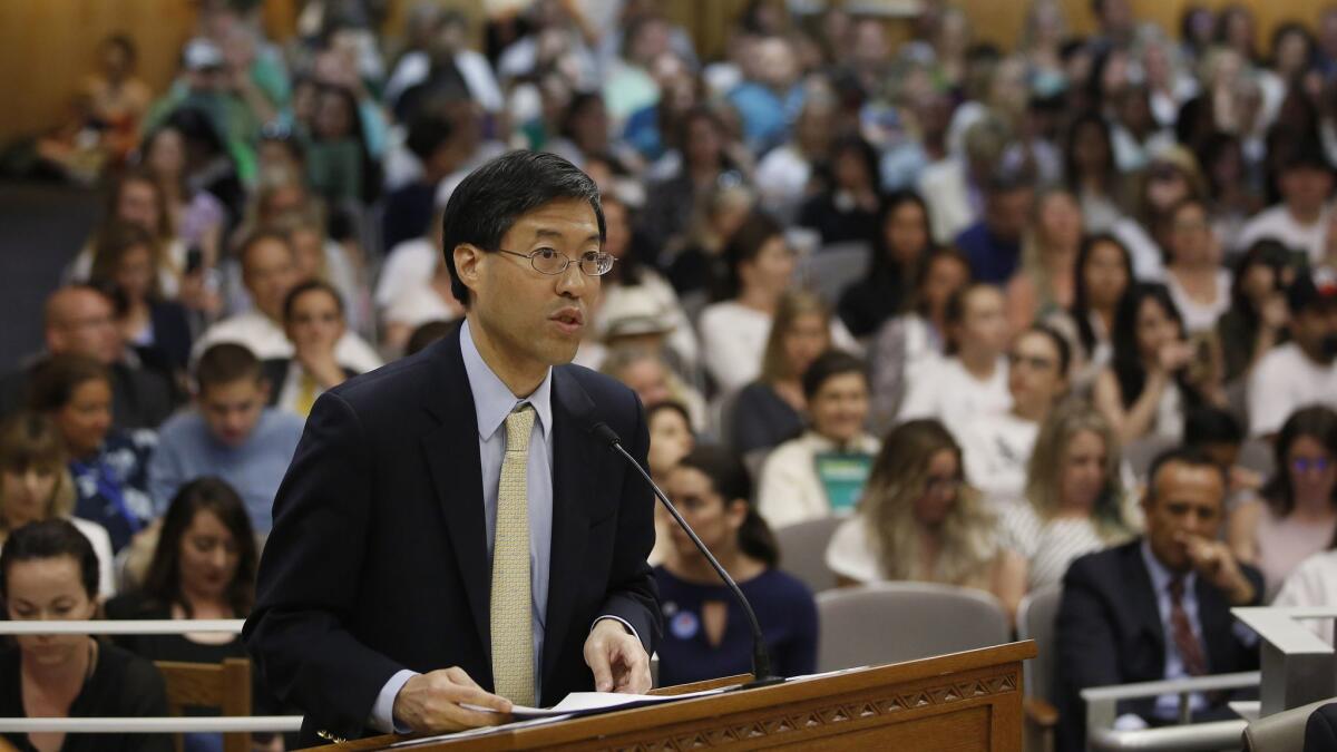 State Sen. Dr. Richard Pan, D-Sacramento, urges lawmakers to approve his proposal to give state public health officials instead of local doctors the power to decide which children can skip their shots before attending school, at the Capitol Wednesday, April 24, 2019, in Sacramento, Calif. Pan, a pediatrician, said his legislation would give state health officials the tools they need to prevent outbreaks of vaccine-preventable diseases like measles. (AP Photo/Rich Pedroncelli)