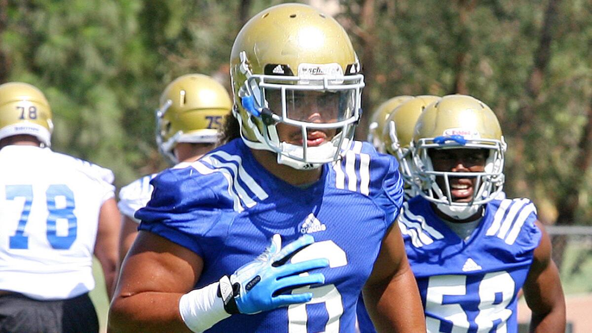 UCLA linebacker Eric Kendricks participates in drills Aug. 4. Kendricks is healthy after suffering several injuries in 2013.