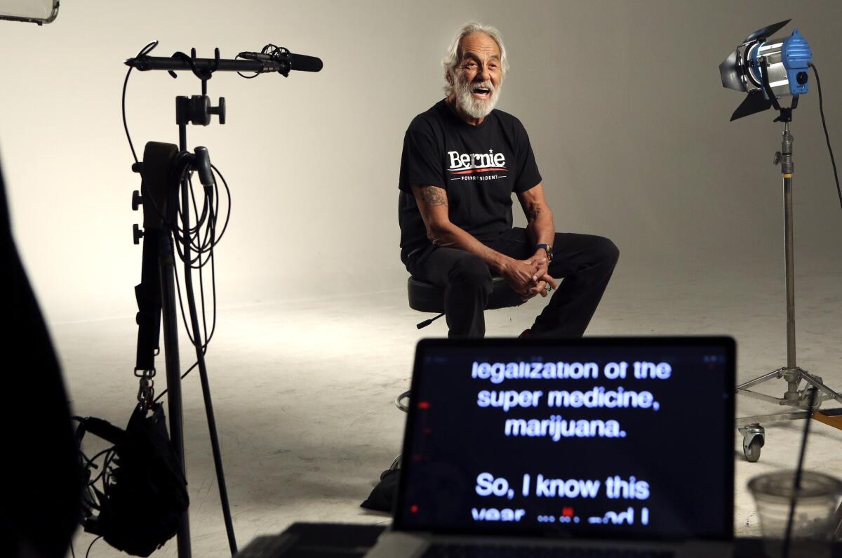 Tommy Chong reads from a teleprompter while cutting a political ad for presidential candidate Bernie Sanders.
