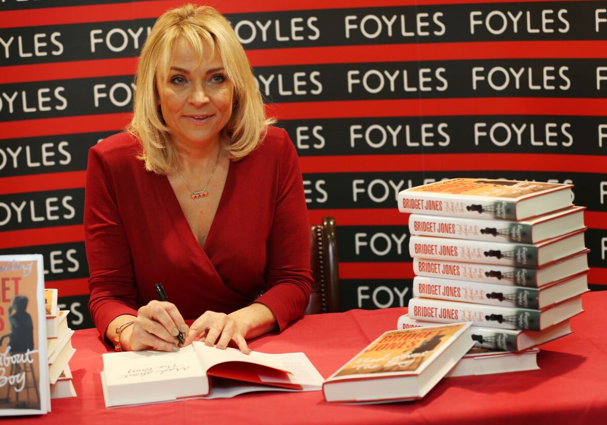 Author Helen Fielding poses for photographs before signing her latest Bridget Jones book "Mad about The Boy" at Foyles bookshop in London, England.