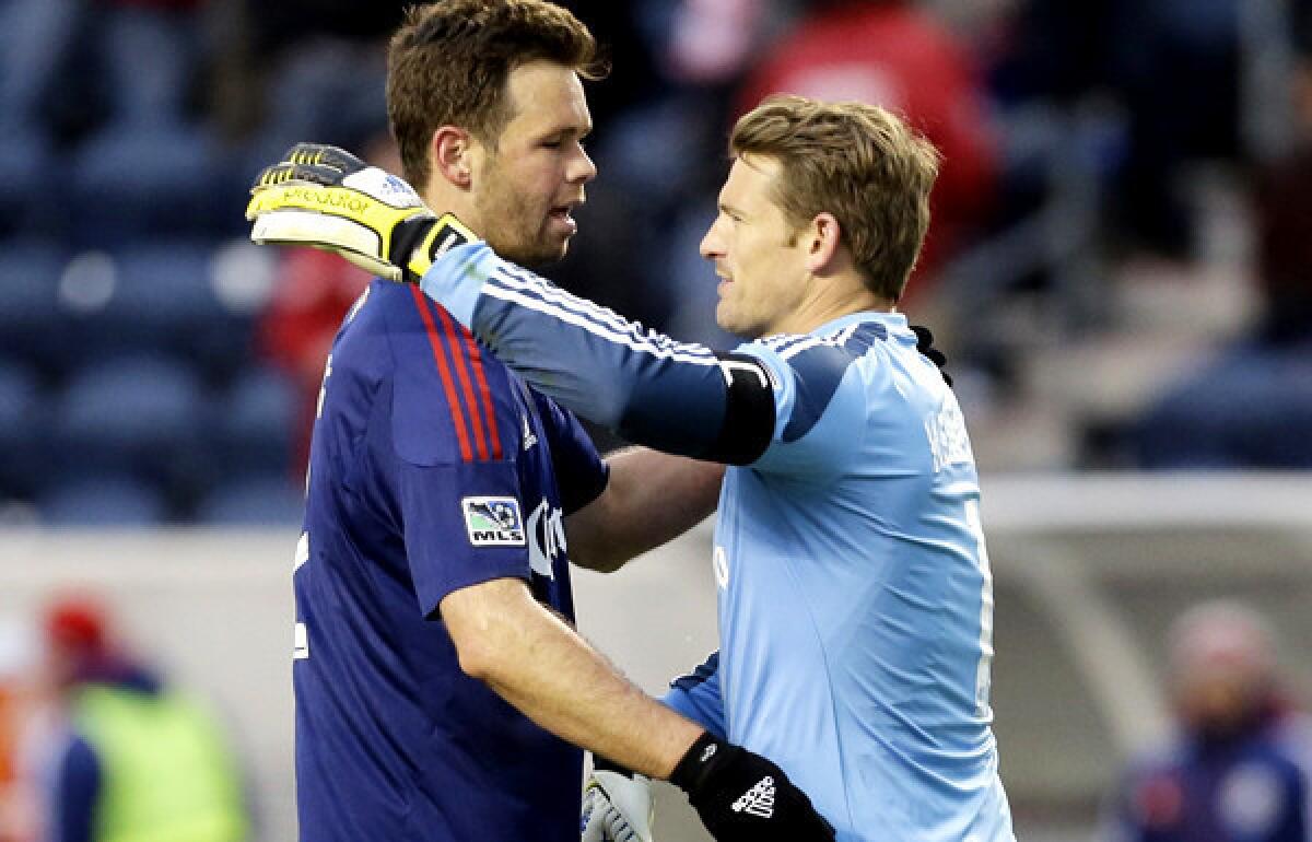 Defender Bobby Burling and goalkeeper Dan Kennedy embrace after Chivas USA defeated the Chicago Fire, 4-1, in an MLS game last month.