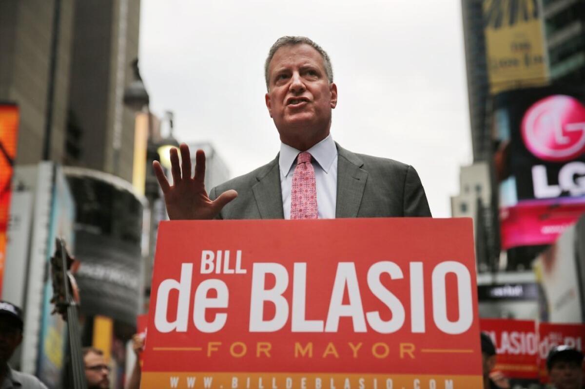Public Advocate and New York City mayoral candidate Bill de Blasio speaks at an endorsement in Times Square by Local 802, which represents musicians playing in Broadway musicals, the Metropolitan Opera, the New York Philharmonic and other musical ensembles.