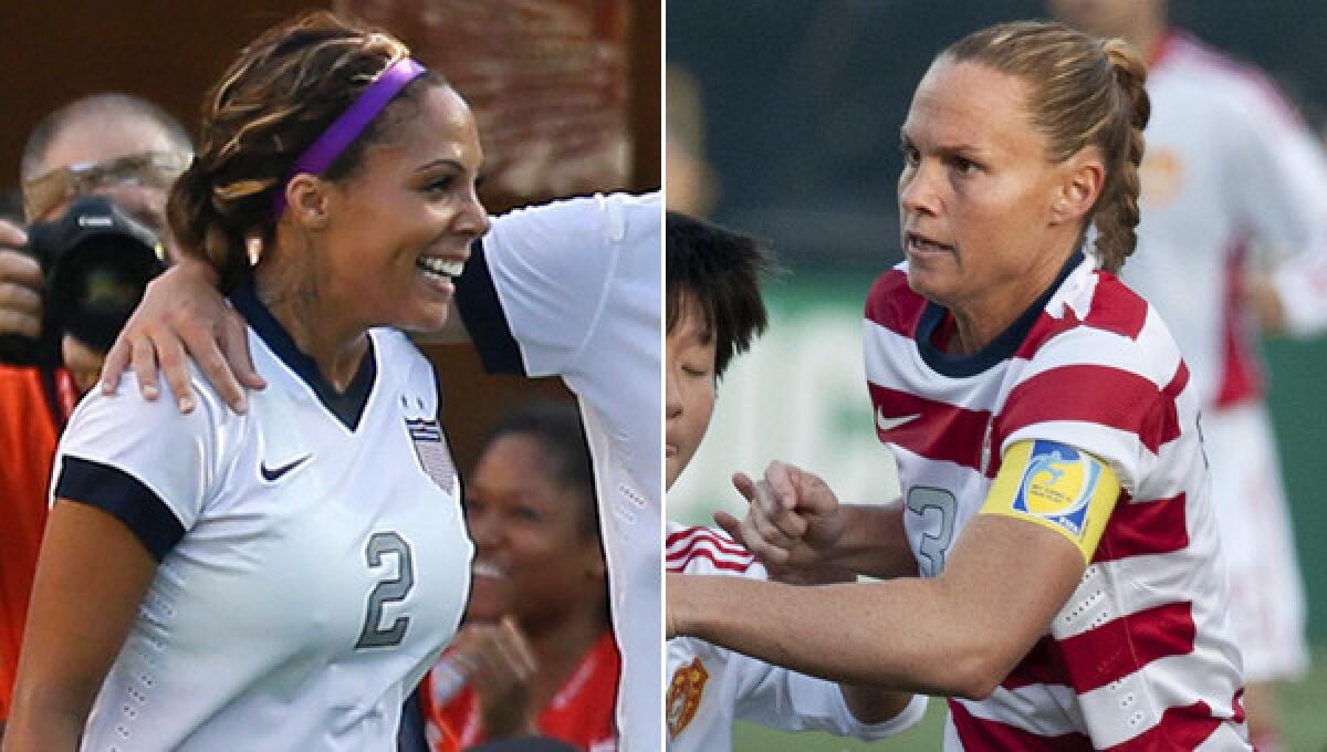 U.S. women's national team players Sydney Leroux, left, and Christie Rampone have learned from one another while practicing together in training camp this month.
