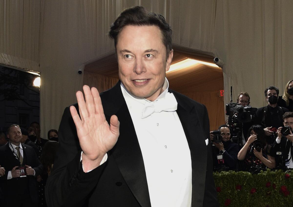 FILE - Elon Musk attends The Metropolitan Museum of Art's Costume Institute benefit gala on May 2, 2022, in New York. Musk caused a stir among Manchester United fans by tweeting that he was buying the English soccer team, then saying several hours later that it was just part of a long-running joke. (Photo by Evan Agostini/Invision/AP, File)