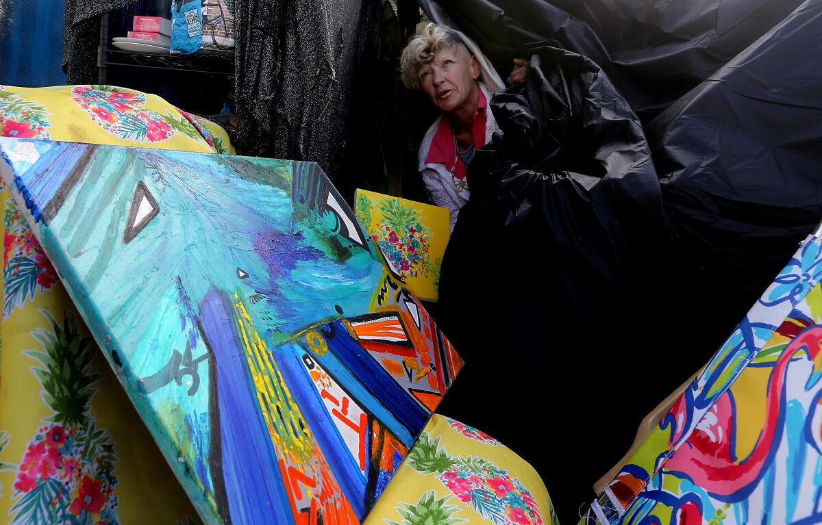 Seren Hkse lives in a plastic tarp tent along the boardwalk in Venice Beach.