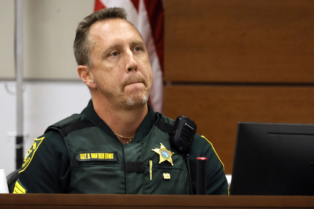 Broward Sheriff's Office Sgt. Richard Van Der Eems describes the scene he encountered at the school after the mass shooting as he testifies during the penalty phase trial of Marjory Stoneman Douglas High School shooter Nikolas Cruz, Friday, July 22, 2022, at the Broward County Courthouse in Fort Lauderdale, Fla. Cruz previously plead guilty to all 17 counts of premeditated murder and 17 counts of attempted murder in the 2018 shootings. (Mike Stocker/South Florida Sun-Sentinel via AP, Pool)