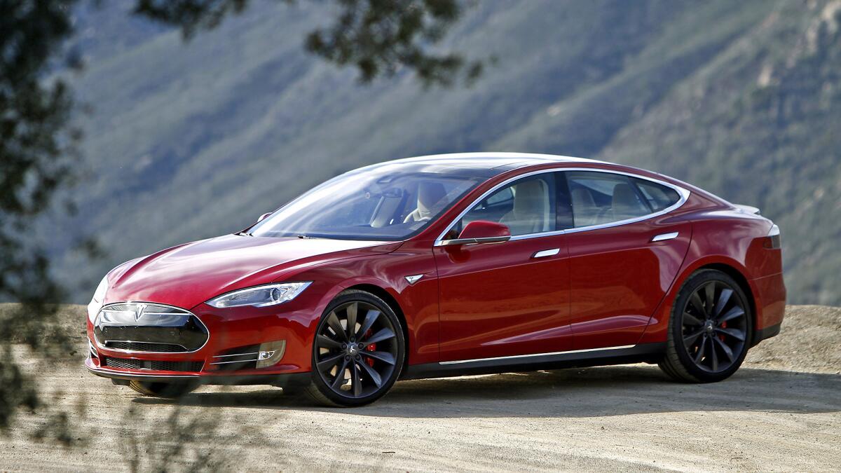 The new Tesla Model S P85D produces extra power with the addition of a second electric motor putting out the equivalent of 691 horsepower. It topped AAA annual ranking of Green Cars.