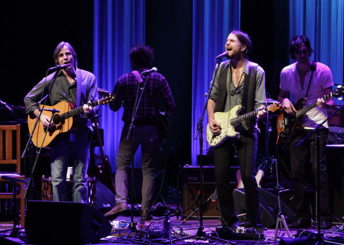 Jackson Browne, left, and singer-songwriter Jonathan Wilson will be among the performers at a Dec. 20 holiday benefit concert at the Troubadour in West Hollywood.