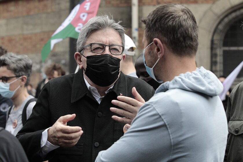 President of the French leftist La France Insoumise party Jean-Luc Melenchon, center, attends a demonstration, Saturday, June 12, 2021 in Paris. Thousands of people rallied throughout France Saturday to protest against the far-right. (AP Photo/Lewis Joly)