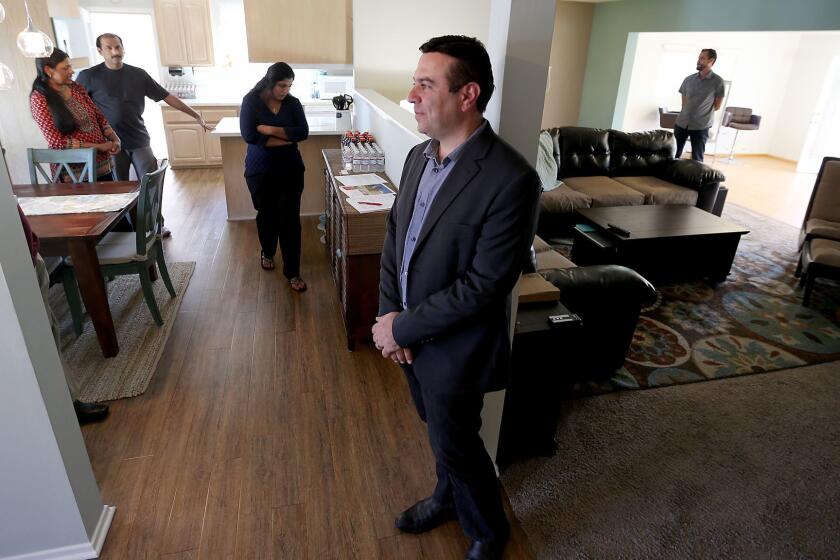 CANOGA PARK, CALIF. - APRIL 2, 2017. Realtor Houman Zahedi holds an open house at a three-bedroom, two-bathroom residence in Canoga Perk on Sunday, April 2, 2017. (Luis Sinco/Los Angeles Times)