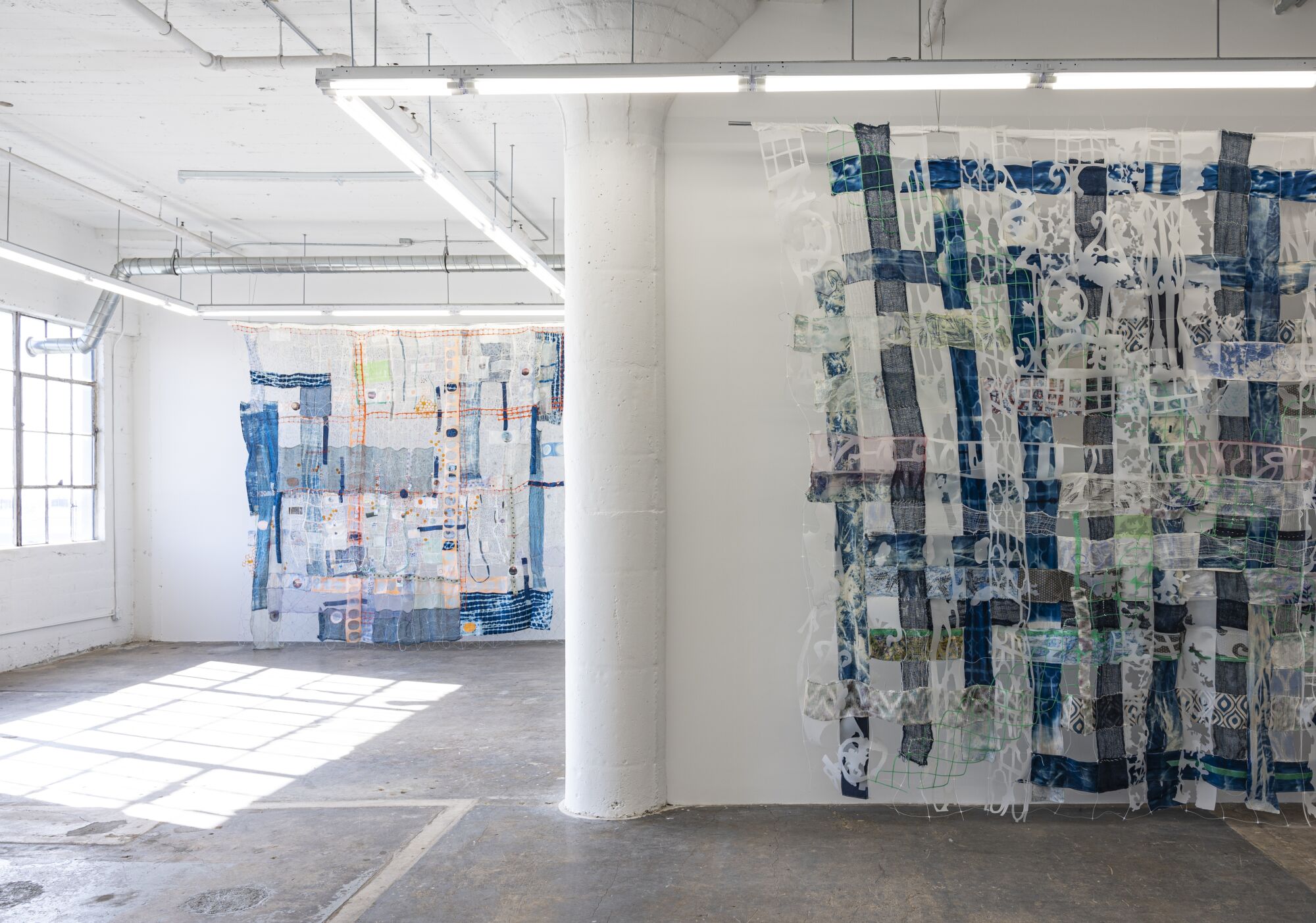 Woven works by Fran Siegel in the two-person show "Seam & Transfer" at Wilding Cran