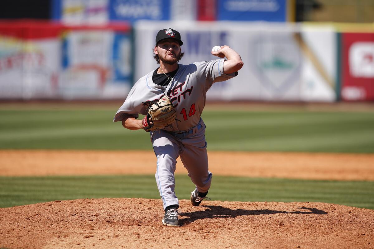 Rocket City Trash Pandas reliever Kolton Ingram delivers a pitch to the plate against the Tennessee Smokies.