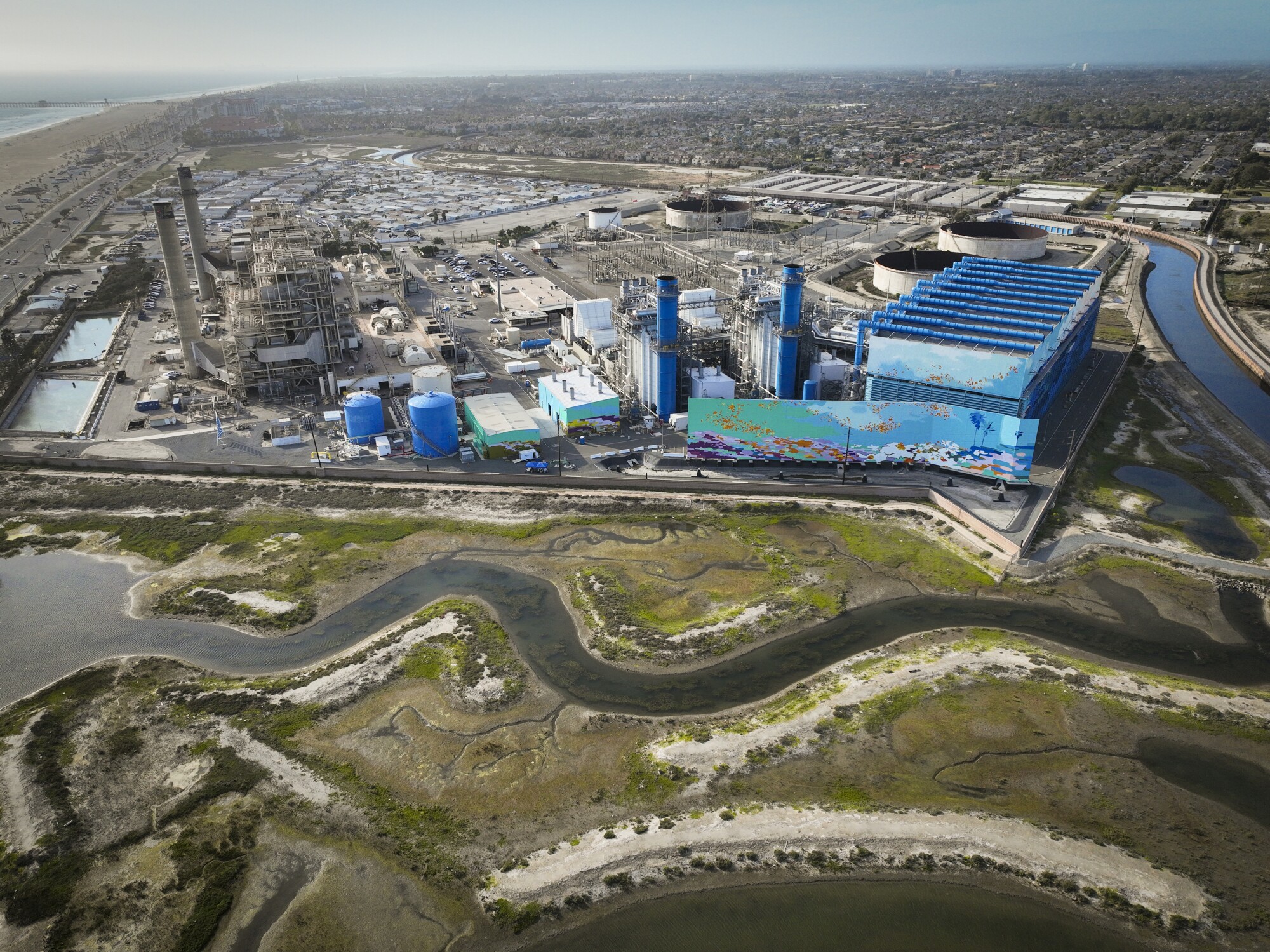 An aerial view of the Huntington Beach Wetlands and the Huntington Beach Energy Center
