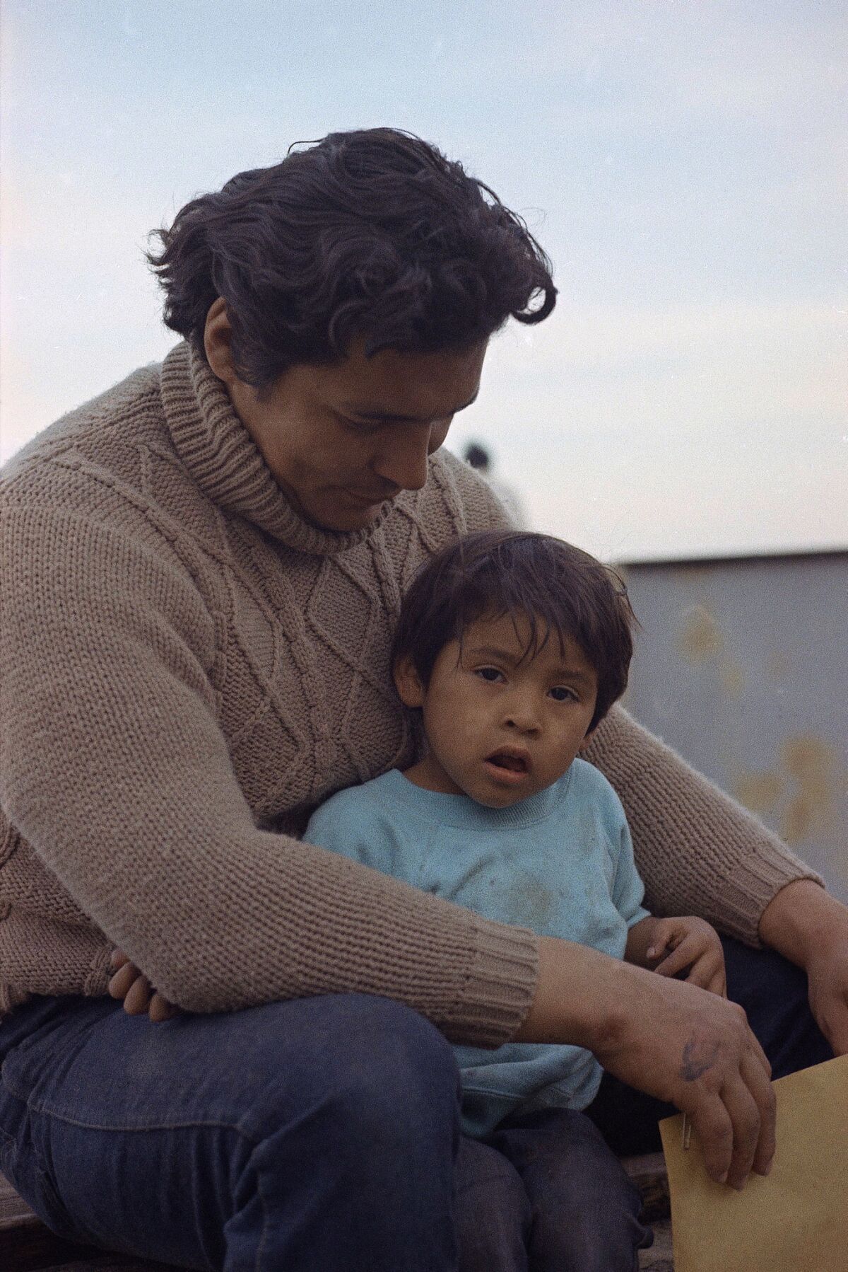 Richard Oakes, one of the Indian leaders, with a small child on Alcatraz, Nov. 17, 1970.