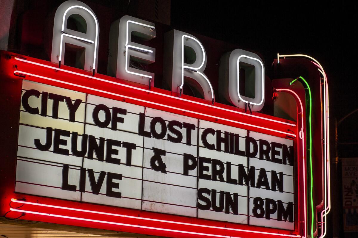 The neon marquee of the Aero Theater advertises a screening of "The City Of Lost Children."