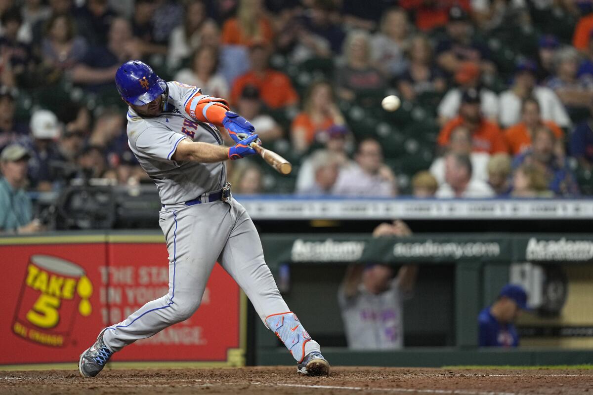 New York Mets' Pete Alonso hits a home run against the Houston Astros during the sixth inning of a baseball game Tuesday, June 21, 2022, in Houston. (AP Photo/David J. Phillip)