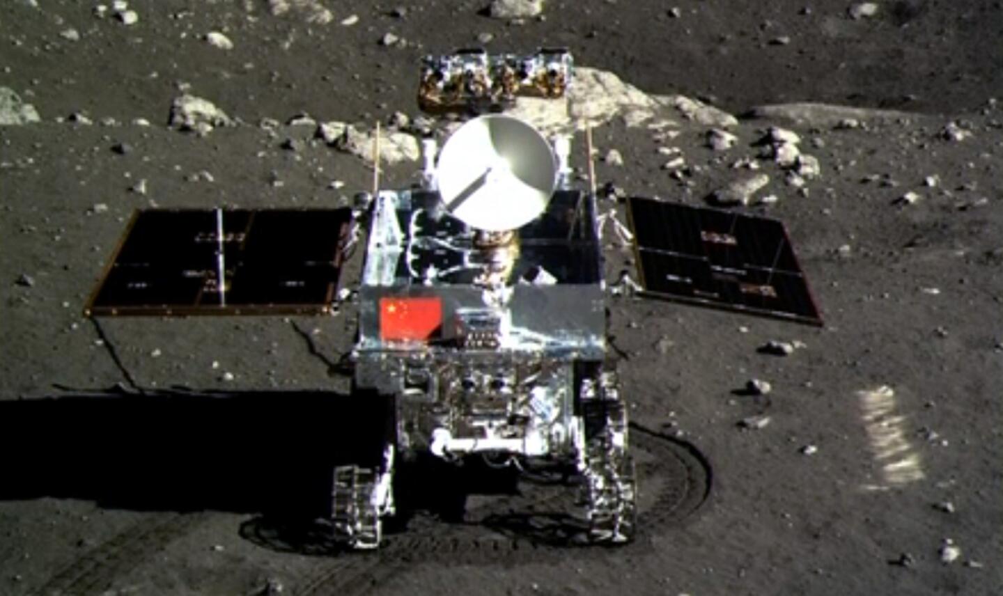 Television footage shows a photo of China's Jade Rabbit lunar rover taken by the Chang'e 3 probe lander on Dec. 15.