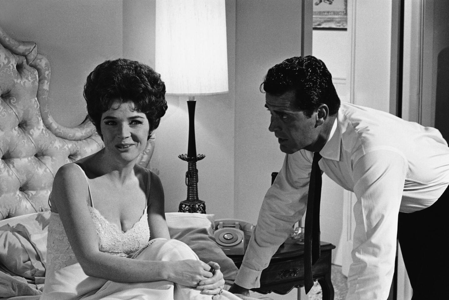 Polly Bergen and James Garner go through a scene during the filming of "Move Over, Darling."