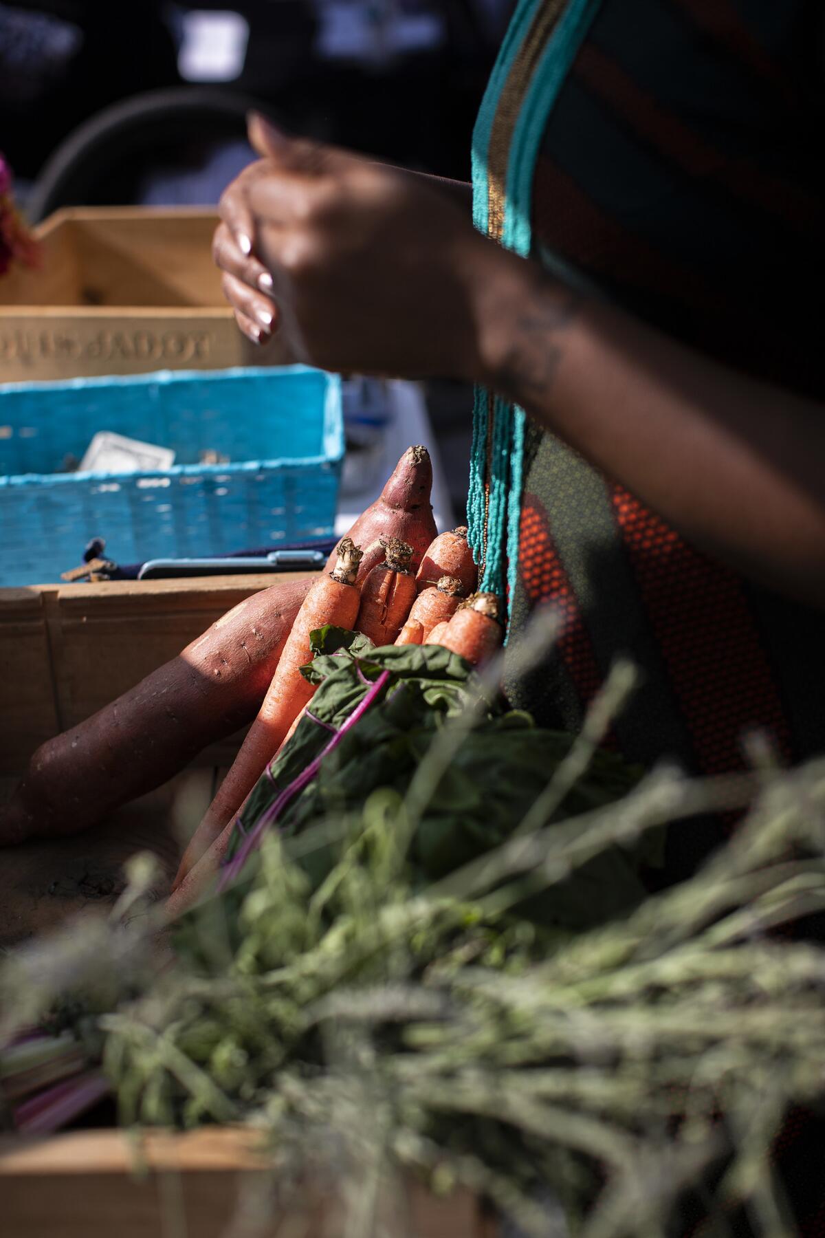 Süprmarkt sells organic produce to communities in South L.A., at stands and via a subscription-based delivery service.