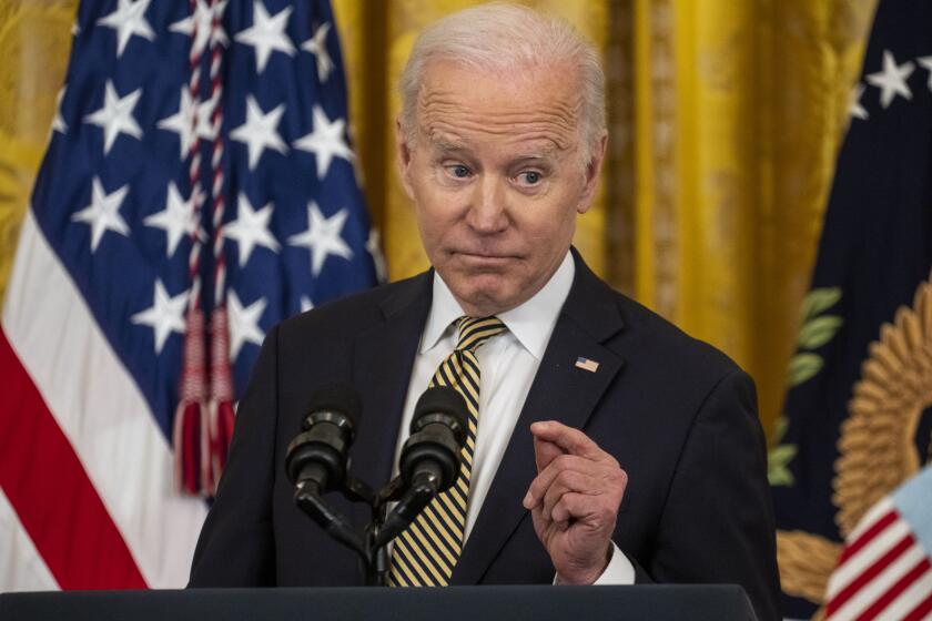 WASHINGTON, DC - MARCH 16: President Joe Biden speaks during an event celebrating the reauthorization of the Violence Against Women Act (VAWA) in the East Room of the White House on Wednesday, March 16, 2022 in Washington, DC. (Kent Nishimura / Los Angeles Times)