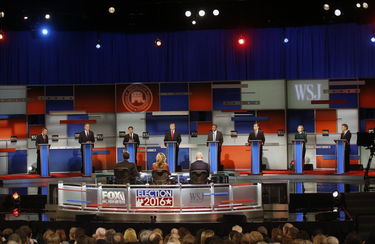 Republican presidential candidates John Kasich, Jeb Bush, Marco Rubio, Donald Trump, Ben Carson, Ted Cruz, Carly Fiorina and Rand Paul appear during Republican presidential debate at the Milwaukee Theatre.