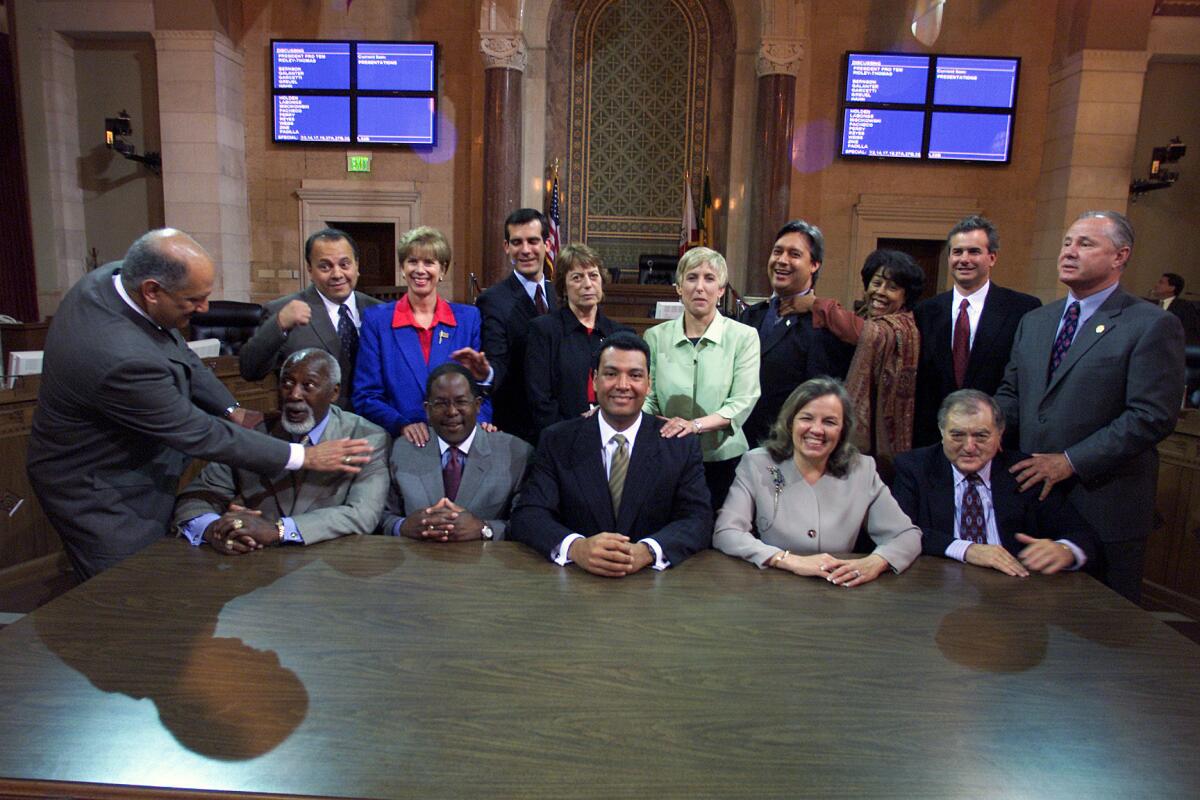 Rep. Janice Hahn (D-San Pedro), standing second from left in back row, and county Supervisor Mark Ridley-Thomas, seated in front of her, shown during a break in a 2002 photo shoot when they served together on the Los Angeles City Council.