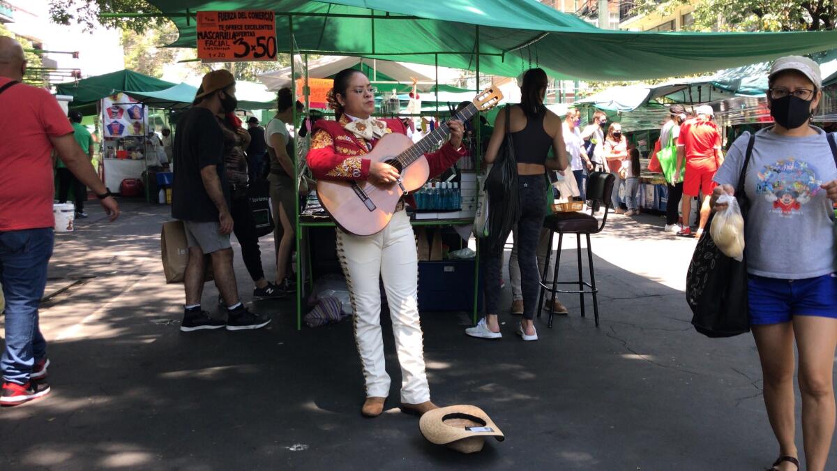 Mariachi singer Nancy Velasco performs in Mexico City.