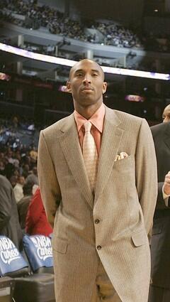 Lakers Kobe Bryant looks on at Staples Center before the season opener against the Phoenix Suns.