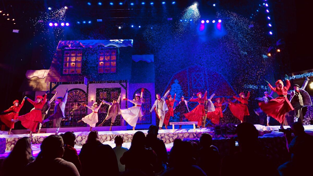 Festive yuletide cheer is in store at Knott’s Merry Farm with the brand-new show for 2019, "Home for the Holidays," where joyous merriment takes over the Calico Mine Stage with dancing and snowfall, set to popular holiday tunes. Guests will be swept into a magical scene of an old-fashioned Winter Wonderland and celebrate timeless holiday traditions — including a magical transformation of the massive stage that happens right before the audience's eyes.