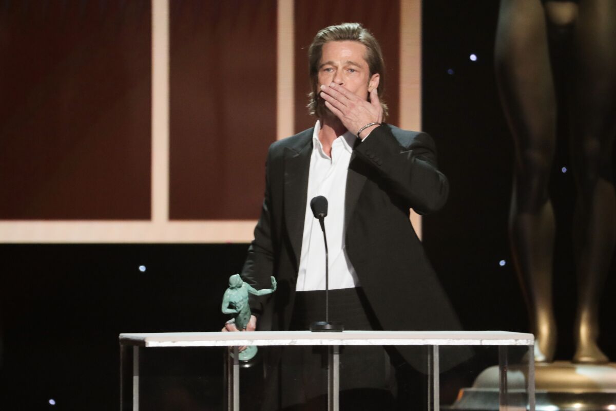 Brad Pitt blows a kiss to the audience at the SAG Awards earlier this month.