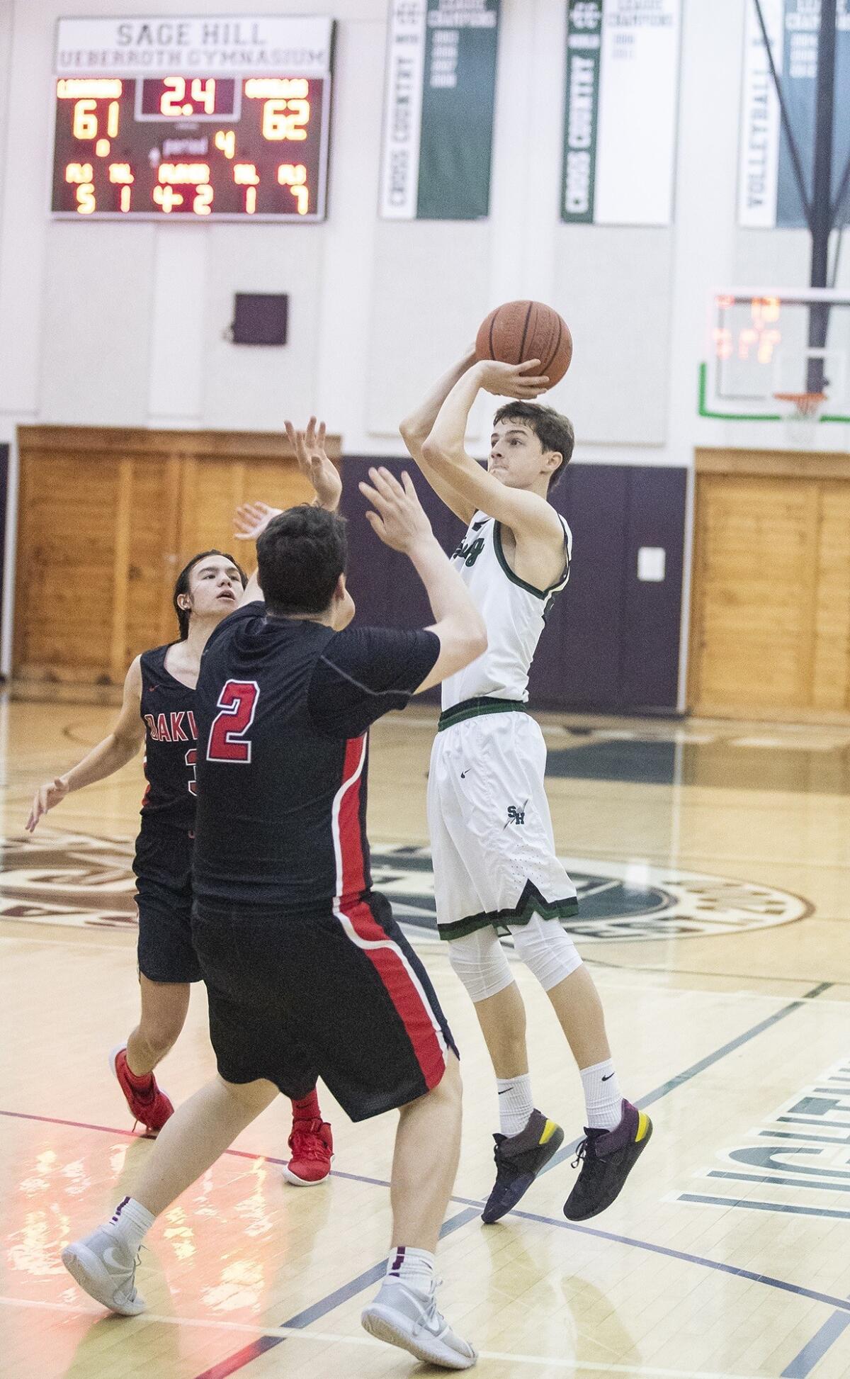 Sage Hill School's Jack Strohman hits a jumper at the buzzer to beat North Hollywood Oakwood 63-62 in a CIF State Southern California Regional Division V playoff opener on Tuesday.