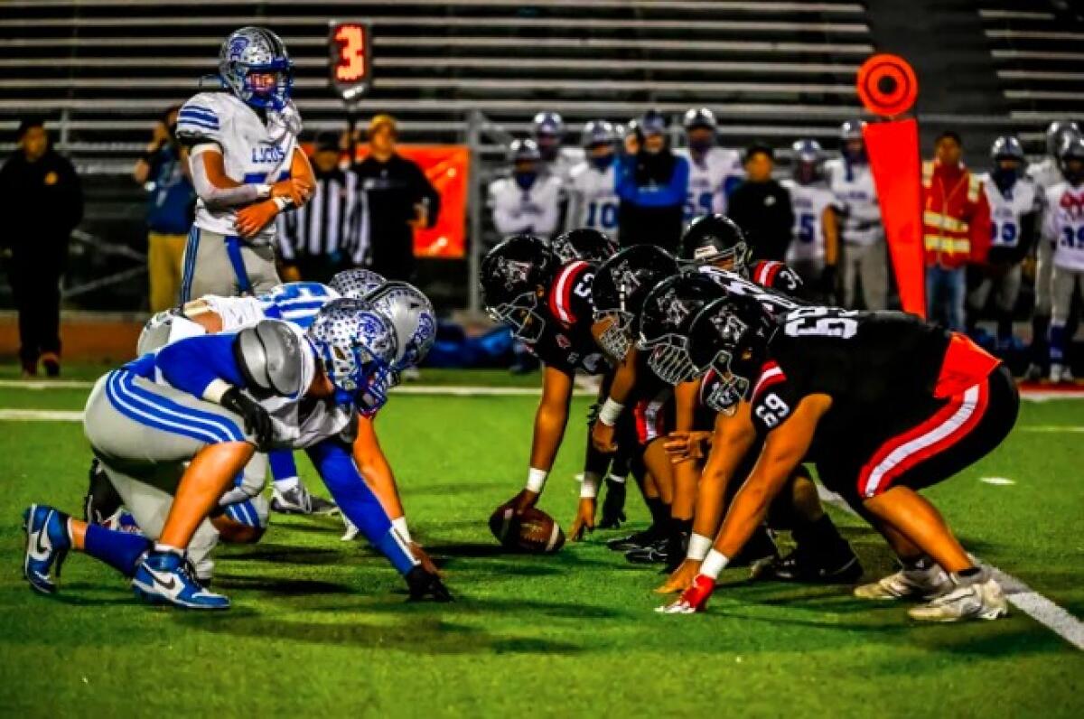 La Jolla Country Day and Banning High of Wilmington line up during the CIF Southern California Division 5-A title game.